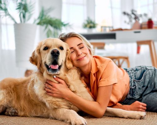 Girl with her pet in the home